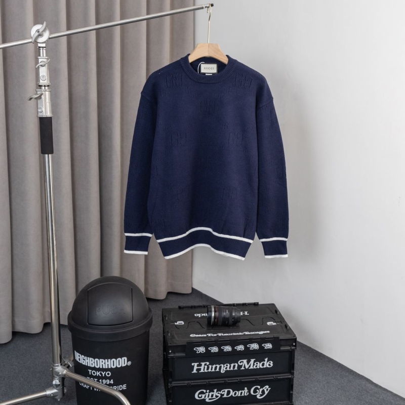 G*u*i sweaters